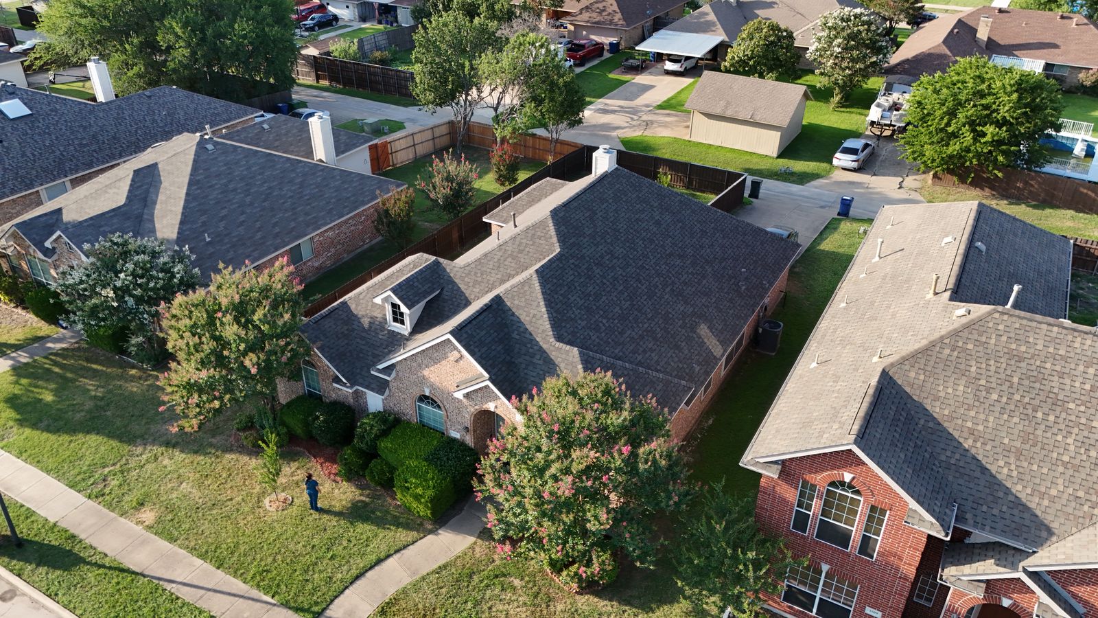 Completed Prestige roof in Weather Wood shingles