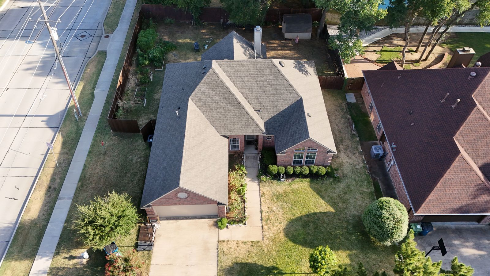 Completed Prestige roof in Weather Wood shingles